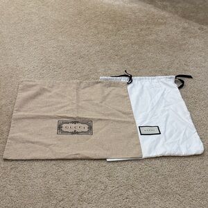 2 Gucci Storage Pouches